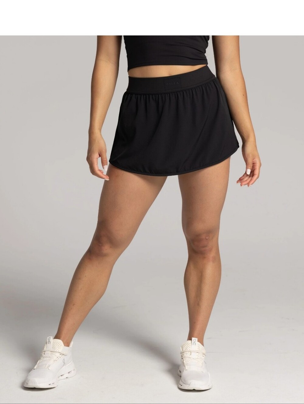 P'tula Black Athletic Flow Skirt with Branded Waist